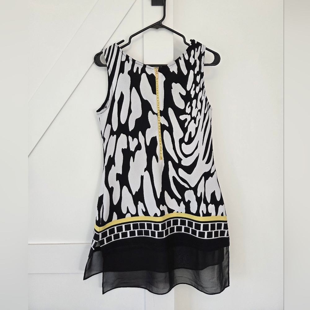 Black and White Patterned Flowy Dresd with Yellow Accent